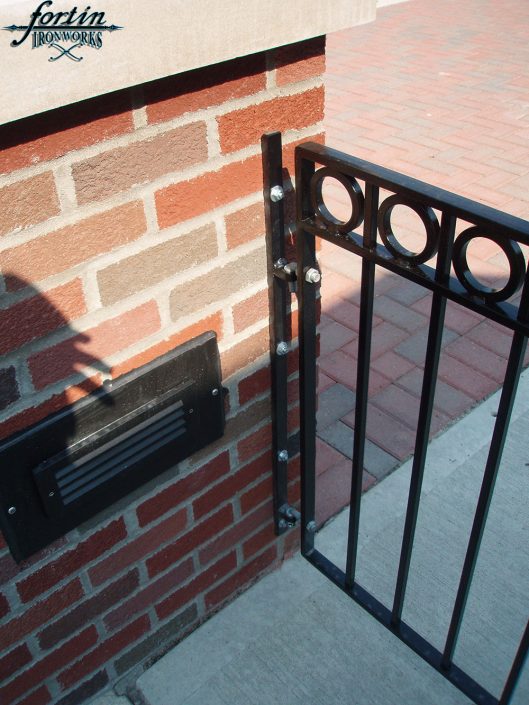 brick column attached walkway gate