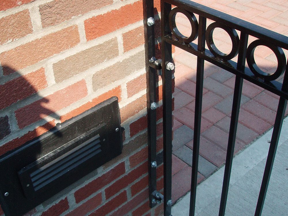 brick column attached walkway gate