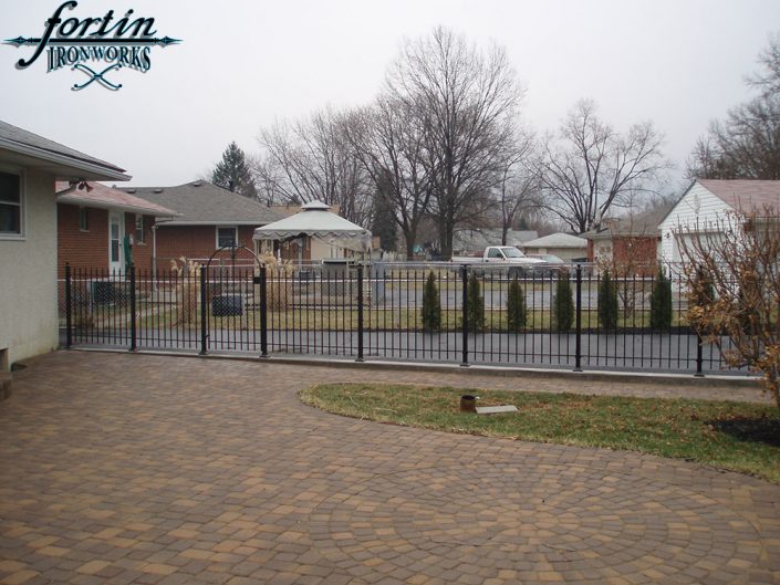 Enclosed back porch with walk way gate