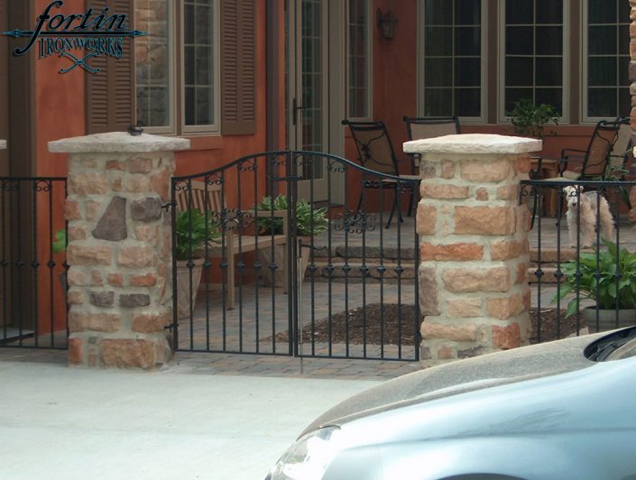 stone pillar attached walk through gate