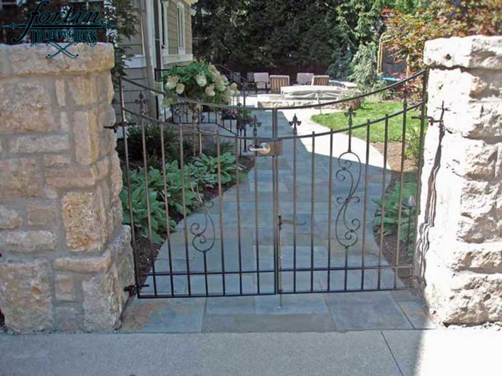 stone pillar attached walk through gate