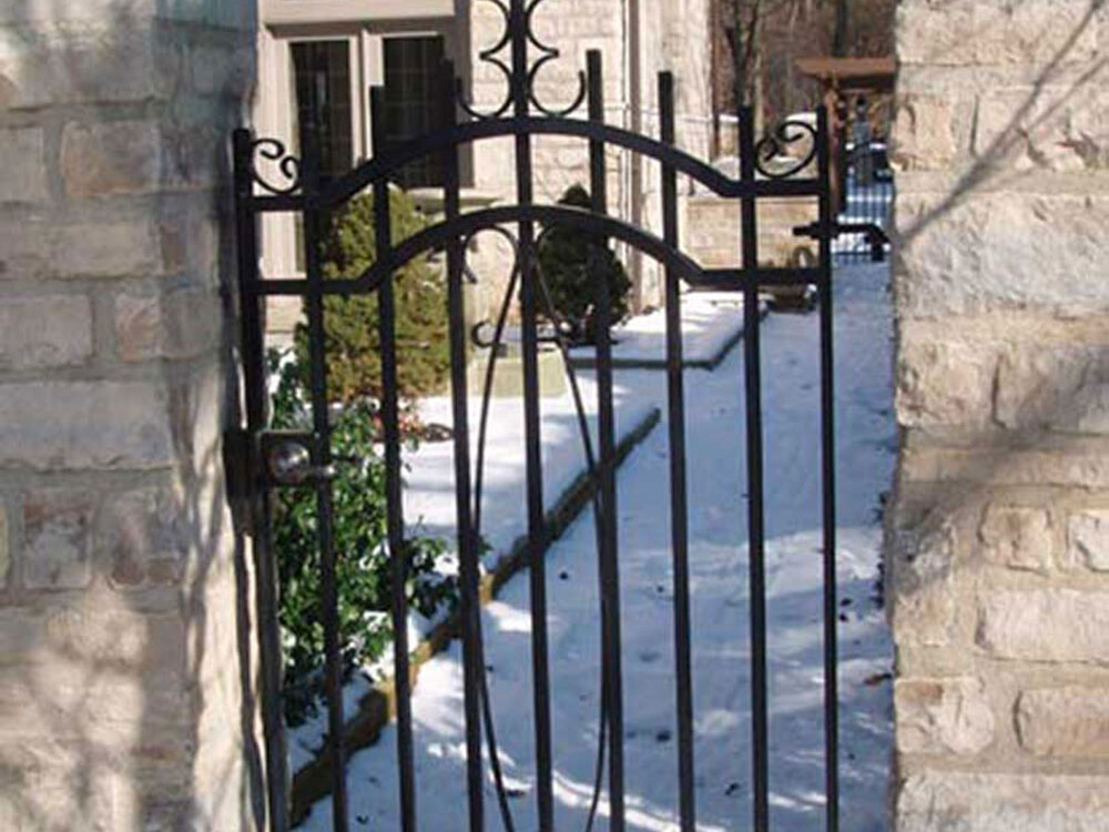 stone pillar attached walk through gate