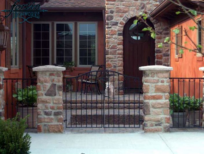 stone pillar attached walk through gate